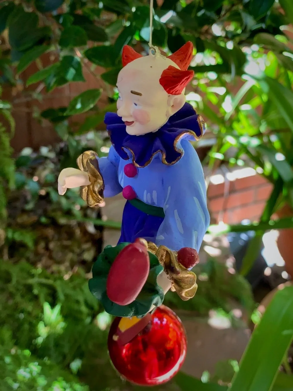 Hand-painted folk art ornament • Lightweight, carved-style construction